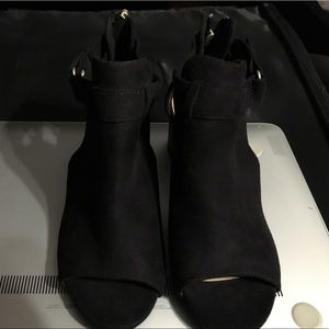 New Black booties. Never worn.